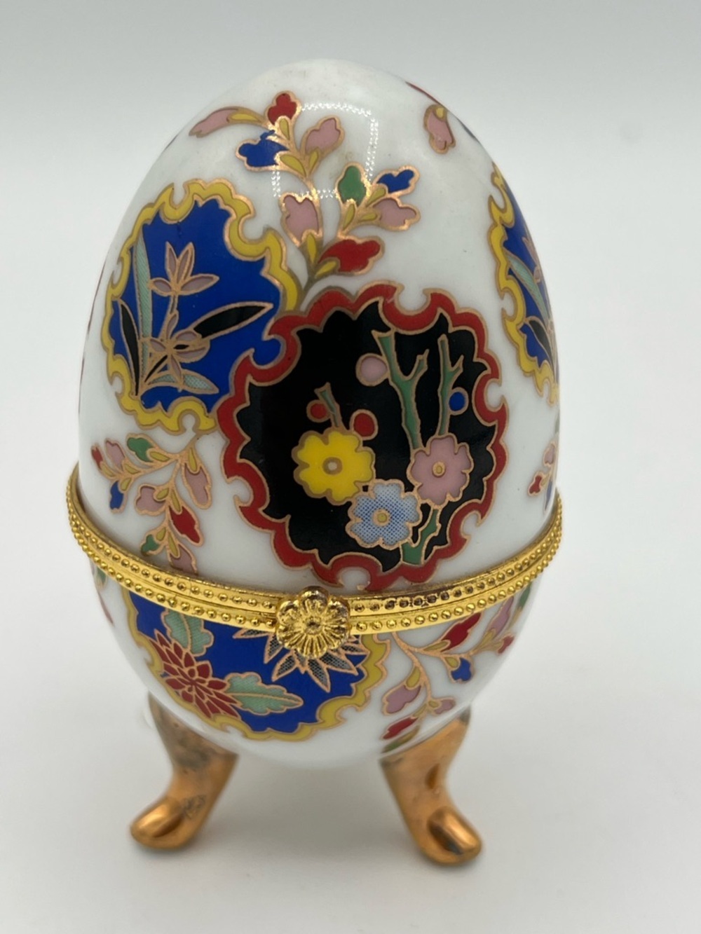 White Porcelain Egg Trinket Box with Blue, Black and Gold Accents